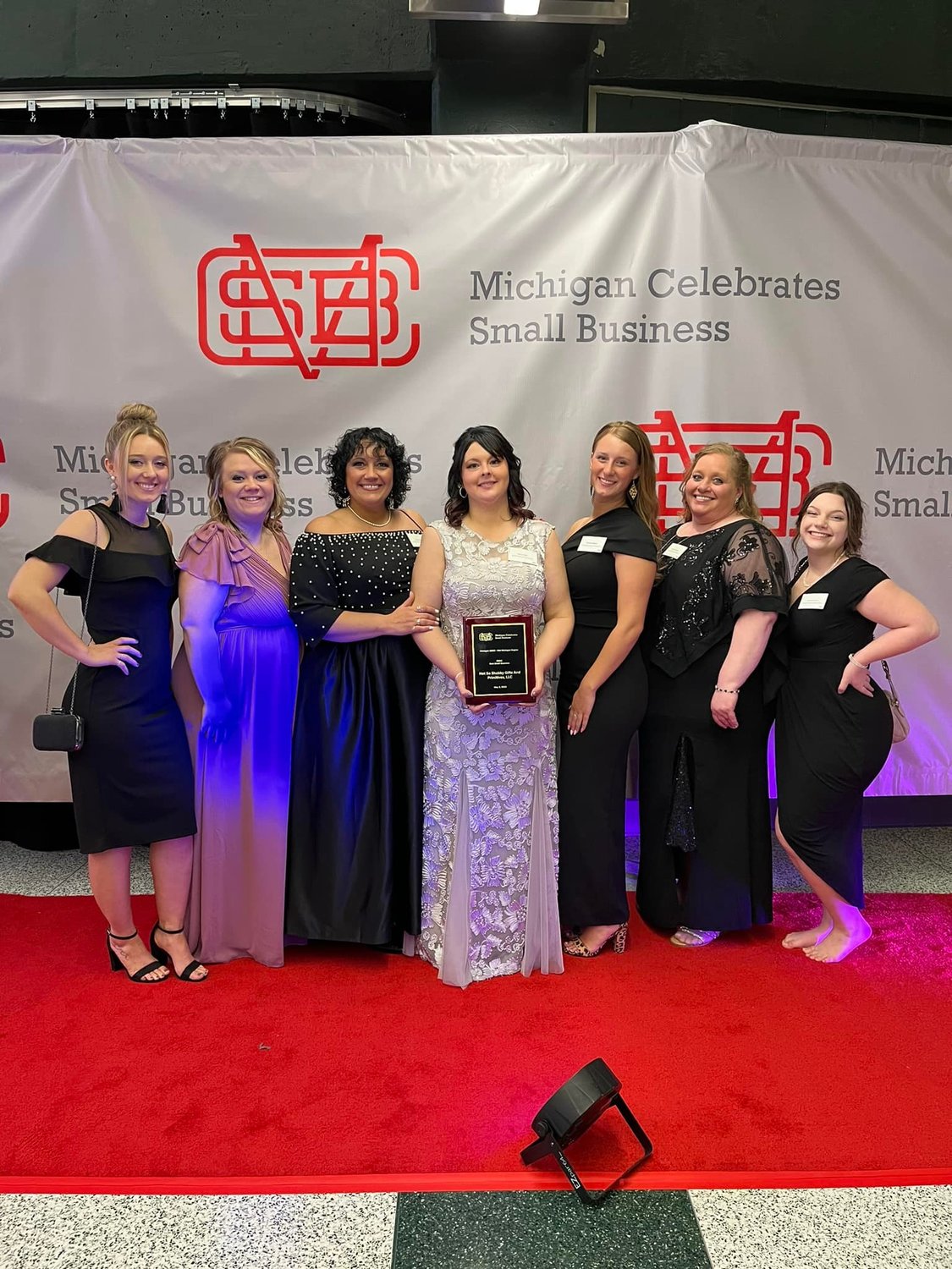 All of Erica Yost’s personnel and many family members attended the Michigan Celebrates Small Business Gala in Lansing ceremony. Pictured, from left, are Aja Heber, Madi LaTulip, Lindsay Heber, Erica Yost, Aliona Heber Leslie Hamilton and Kenzie Farison.